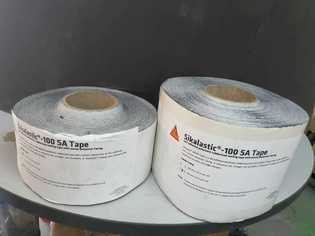 Sikalastic-100 SA Tape - 100mm/30m- VE 150mm/30m Dokuma polyester kaplamalı, kendinden yapışkanlı, polimerik kauçuklu çatı bandı.